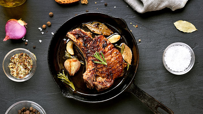 pork chop in a frying pan
